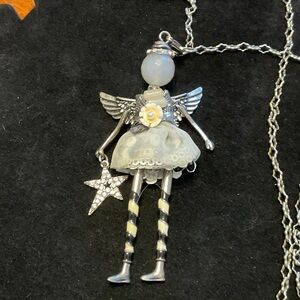 Jacqueline Kent  “Happiness” Charming Silver Angel Necklace with Star Pendant